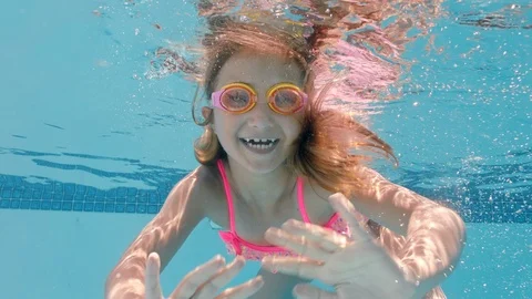 Little Girl Underwater Stock Footage ~ Royalty Free Stock Videos | Pond5