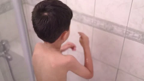 Happy Little preschooler having a shower by himself Stock Footage 204967053
