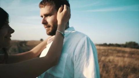 Happy Lovers hugging each other on field , slow motion Stock Footage 68934949