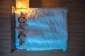 The happy lovers lay on the bed. evening night time. view from above Photo