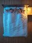 The happy lovers lay on the bed. evening night time. view from above Photo