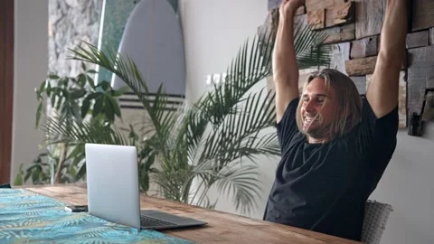 Happy lucky man at computer win sport bet. Successful person celebrate victory. 動画素材 236699146