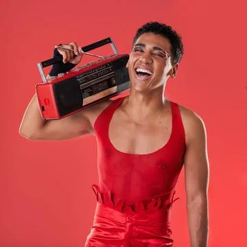 Happy, man and boombox radio in studio for gay, pride and vogue aesthetic with Stock Photos