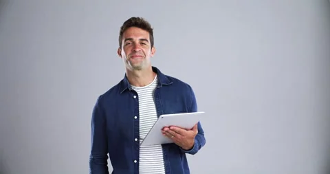 Happy, man and face with tablet in studio for social network, ebook subscription Stock Footage 257600431