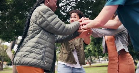 Happy, man and friends with stack at park for social inclusion, solidarity and Stock Footage 347409559