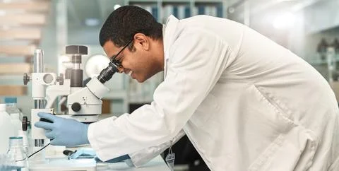Happy, man and scientist with microscope in lab for research, studying samp.. Stock Photos