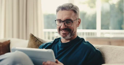 Happy, man and scroll in home with tablet, reading ebook and internet Stock Footage 342237330