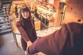 The happy man and a woman hold hands in the restaurant Photo