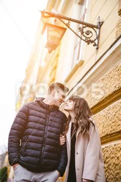 The happy man and the woman stand on the street Stock Photos