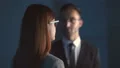 The happy man and a woman talking in the dark room 4k or 4k+ Resolution