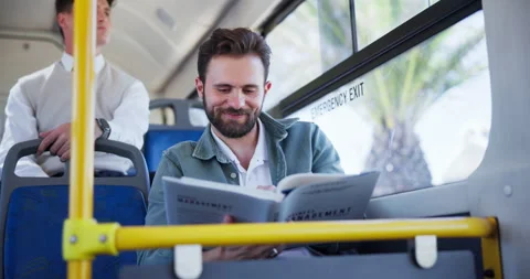 Happy man, bus and reading with book for travel, commute or management knowledge Stock Footage 305861733