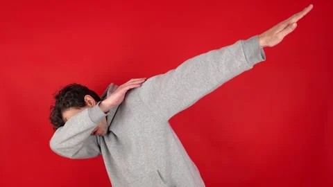 Happy man in casual making dab arms gesture 動画素材 304746032