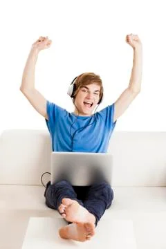 Happy man on the couch Stock Photos