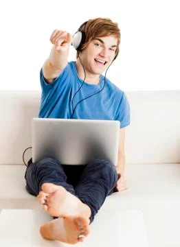 Happy man on the couch Stock Photos