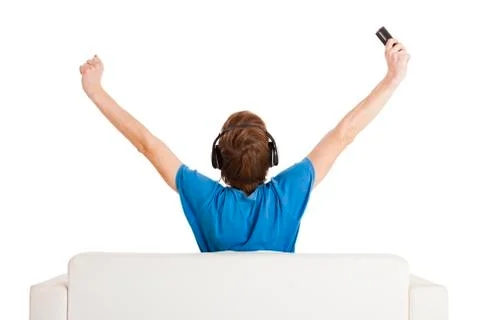 Happy man on the couch Stock Photos