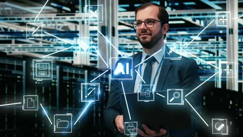 Happy man in data center using laptop, coordinating backups, AI AR overlay Stock Footage 333166822