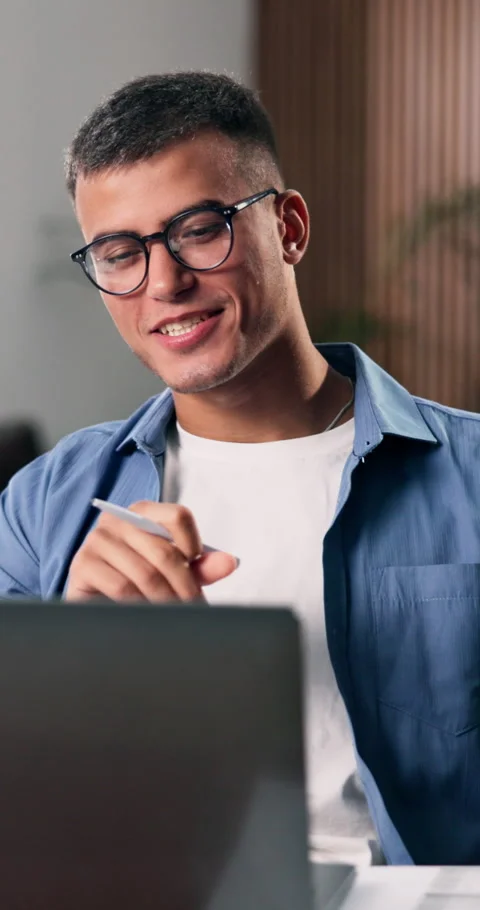 Happy man, documents and video call with laptop in office for virtual meeting or Stock Footage 332969008