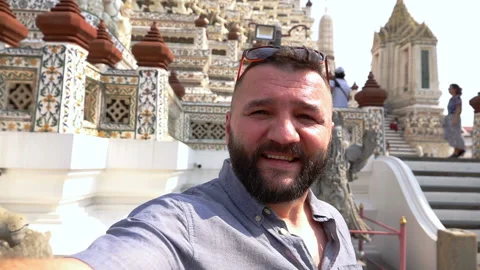 Happy man doing selfies while sightseeing, slow motion shot at 240fps Stock Footage 88160373
