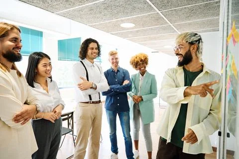 Happy man during a brainstorming using post-its Stock Photos
