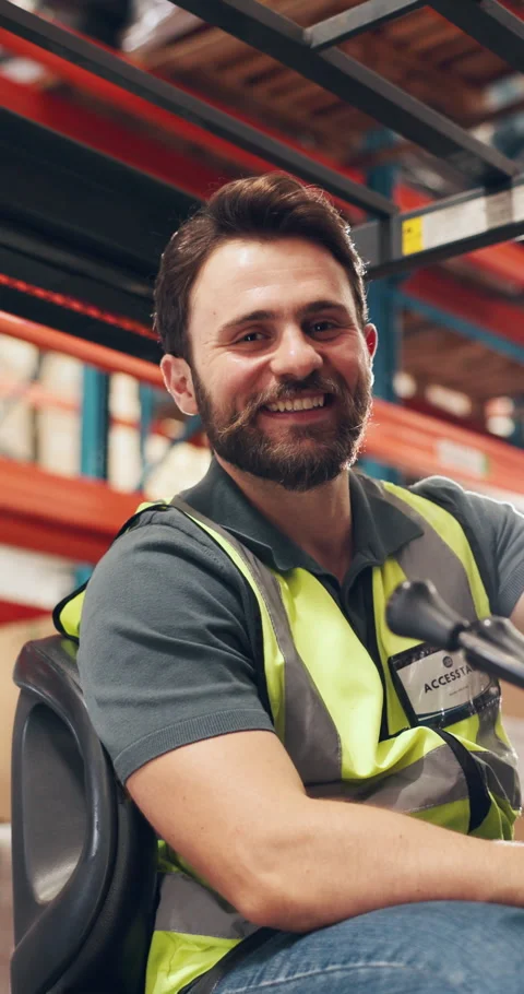Happy man, face and operator with forklifter in warehouse for cargo Stock Footage 327704088