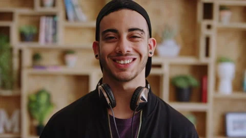 Happy man, face or student with headphones for creative scholarship, knowledge Stock Footage 334707774