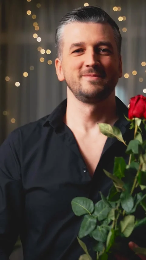 Happy man hands holding huge bouquet of red roses scarlet flowers. Romantic in Stock Footage 311982471