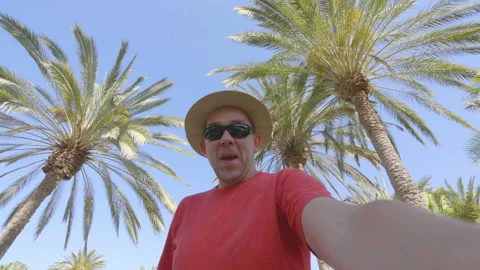 Happy man having fun and enjoying tropical resort in 4k slow motion 60fps Vídeos de archivo 111840501