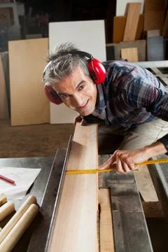 Happy man in his workshop Stock-Fotos