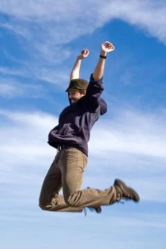 Happy man jumping Stock Photos