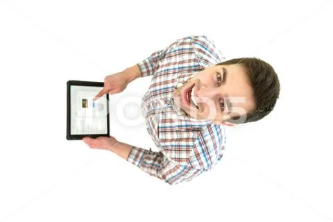 The happy man with laptop look to the camera. View from above Stock Photos