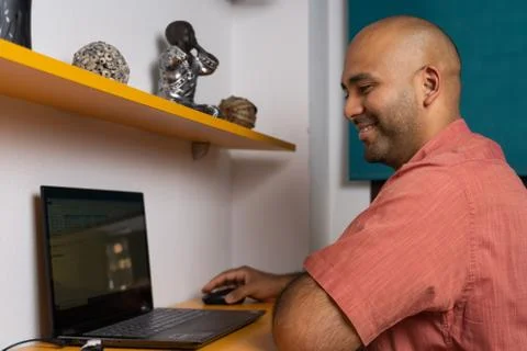 Happy man looking at computer Stock Photos