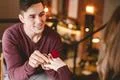The happy man makes an offer of marriage to his girlfriend Photo