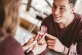 The happy man makes a proposal to his girlfriend Photo