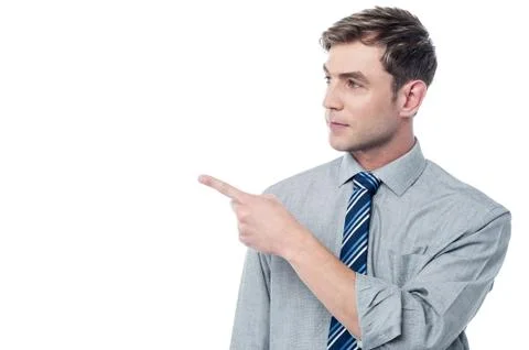 Happy man pointing at something Stock Photos