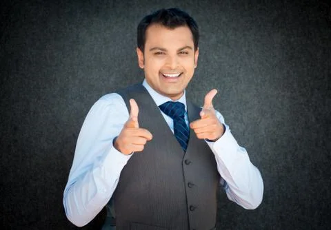 Happy man pointing at you Foto stock