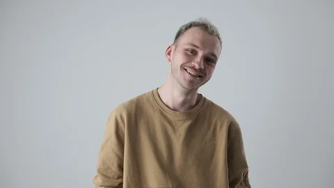 Happy man posing over white background Video stock 105189109