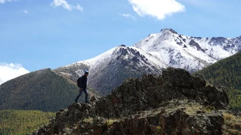 Happy man on the rock. Stock Footage 55007987