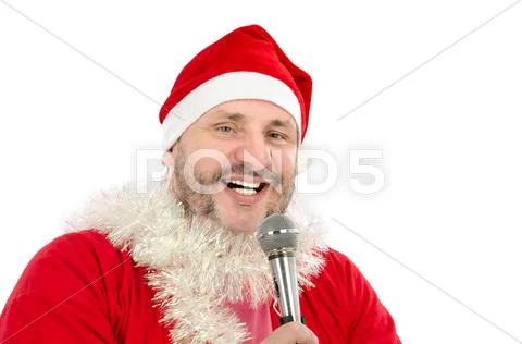 Happy man in santa suit costume singing Stock Photos
