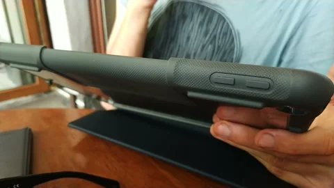 Happy man sitting on the bench using tablet Stock Footage 111502721