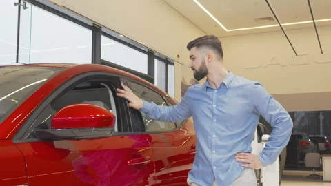 Happy man smiling to the camera after buying new car Stock Footage 147548972