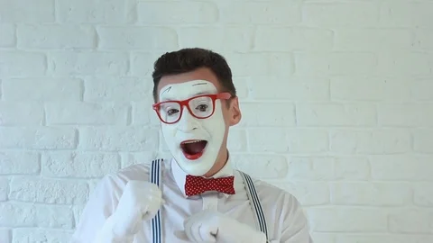 Happy  man smiling at the camera. Pantomime Stock Footage 91528876