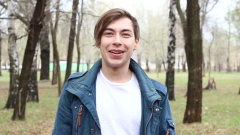 Happy man smiling in park Stock Footage 112226496