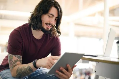 Happy man, tablet or planning for web design research, ideas or vision for Stock Photos