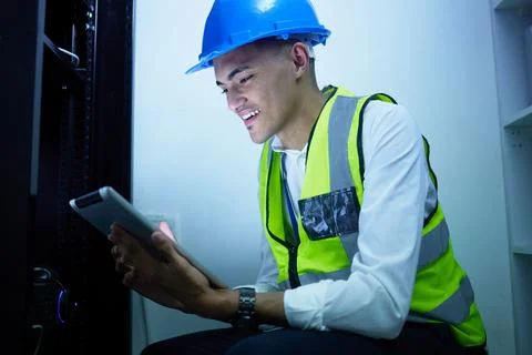 Happy man, tablet or server room technician, engineer and smile for data center 스톡 사진