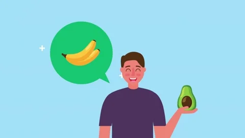 Happy man thinking about healthy fruits, holding an avocado in a dynamic an.. Stock Footage 333428987