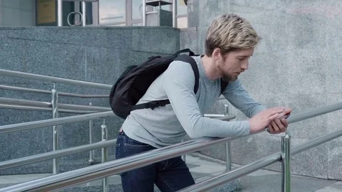 Happy man touch a smartphone Video stock 78739944