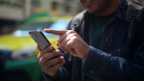 Happy man tourist using application in smartphone booking searching map location Stock-Footage 295344805