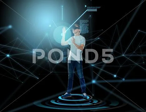 Happy man in virtual reality headset or 3d glasses Stock Photos