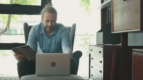 Happy Man Work at Home. Using a laptop is me Stock Footage 139935951