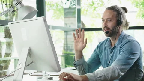 Happy Man Work at Home. Using a laptop is meeting explain a team Stock Footage 139936135